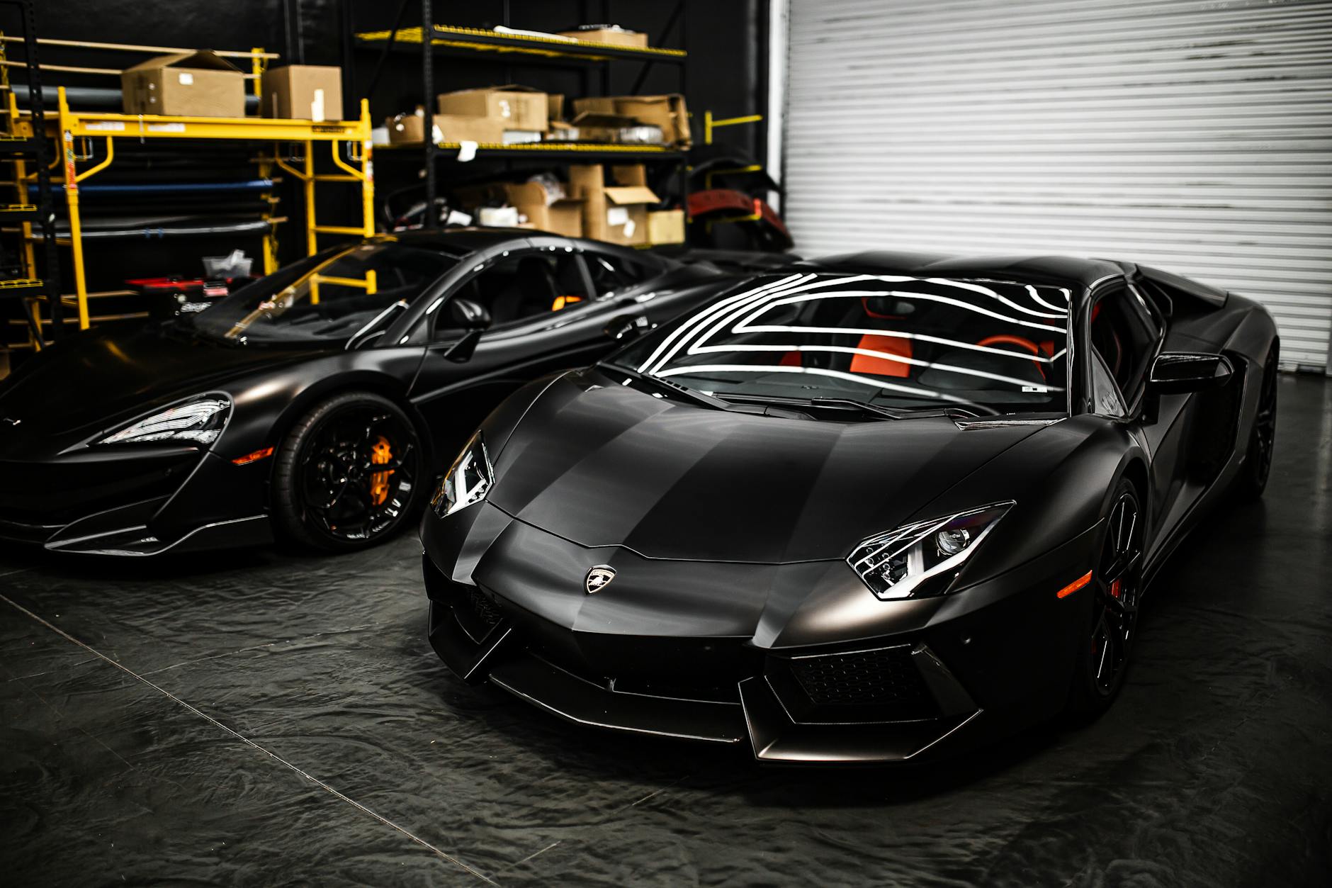 black cars parked in a garage